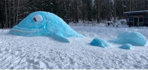 snow sculpture of whale