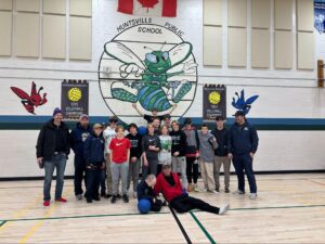 Huntsville hockey team with student 2024